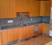 Custom granite counters with full height backsplash done by RMG