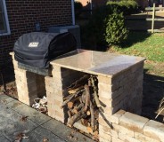 Custom granite outdoor grill surround done by RMG